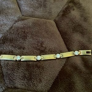7” stainless steel bracelet done in goldtone